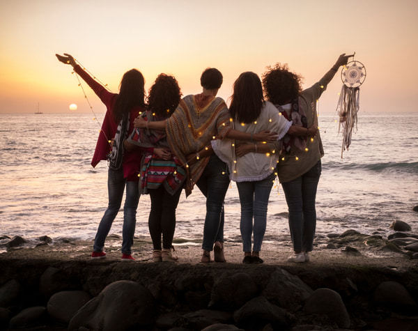 SU - Sow your money seeds Group of females friends hug each other all together