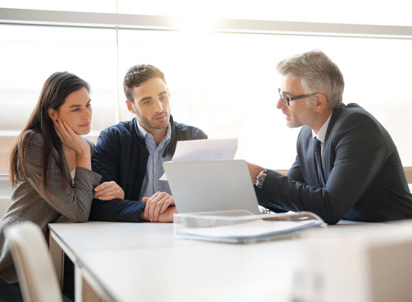 Step Up Group - Emotion-free investing Young couple meeting financial advisor for investment