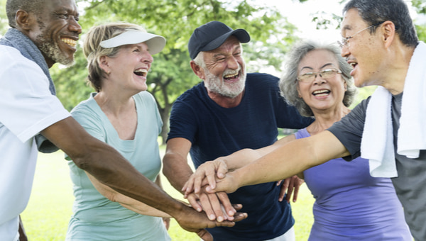Group of retired senior exercising together