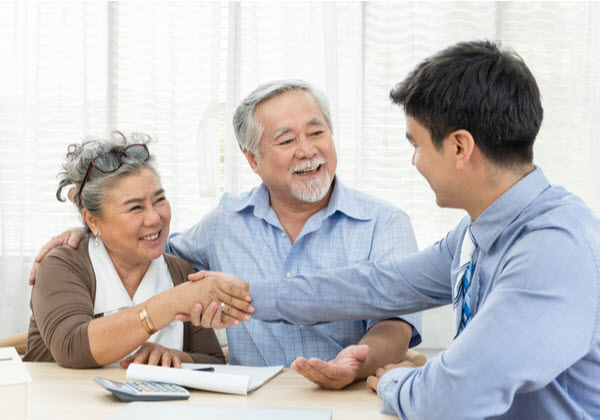 Step Up - Property loan Senior couple talking to adviser