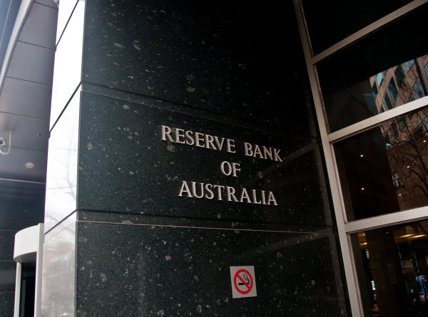 Step Up Group - Inflation vs Interest rates Reserve Bank of Australia name on black granite wall in a building