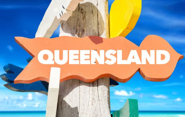Step Up Group - New land tax law Queensland welcome sign with beach