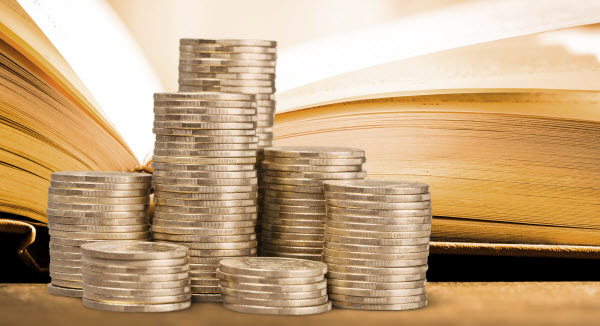 Step Up - 2023 budget bible A stack of coins with a Holy Bible Book