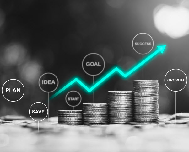 Stacked coins arranged with technology icons on the top, the idea of starting a financial start to the goal